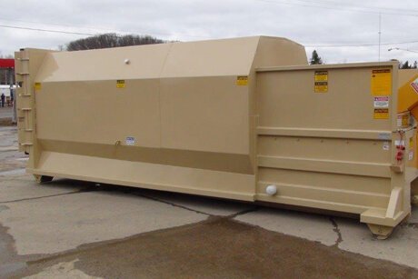 Photo of a commercial compactor in place.